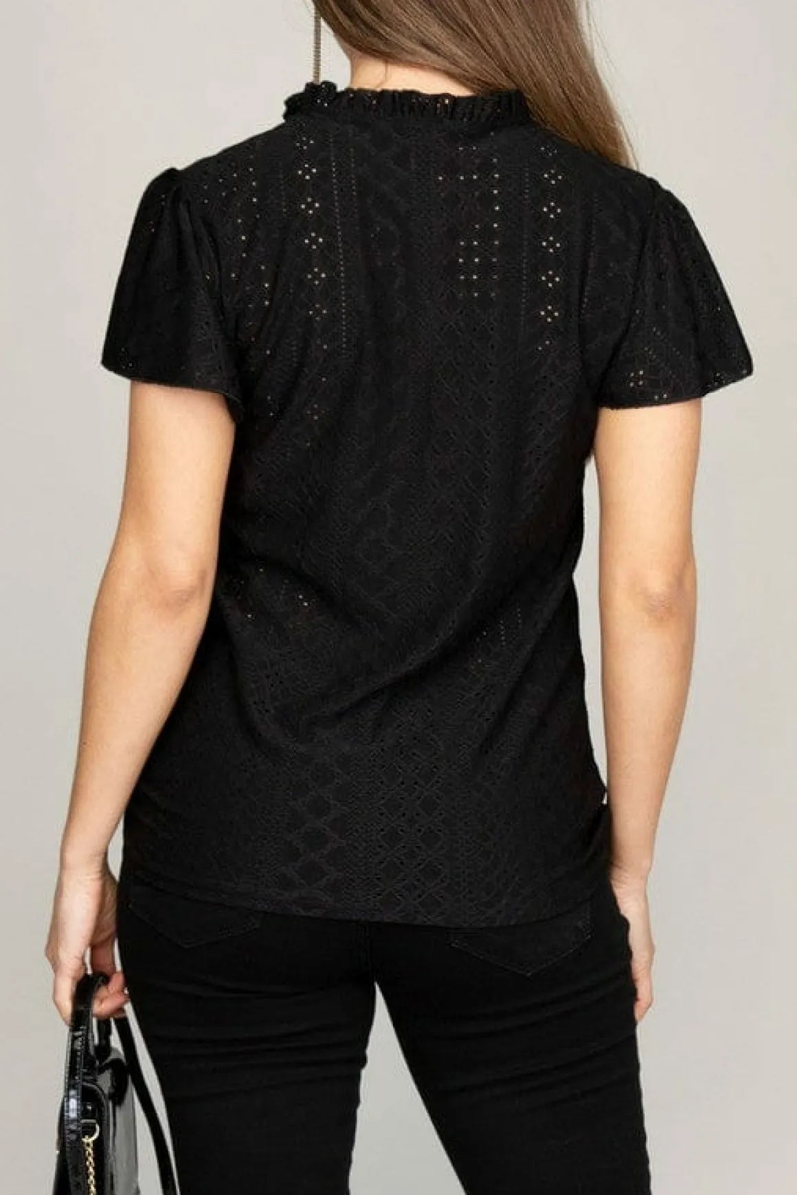 embroidered_eyelet_blouse_2.webp Embroidered eyelet blouse with ruffle *Online Only*
