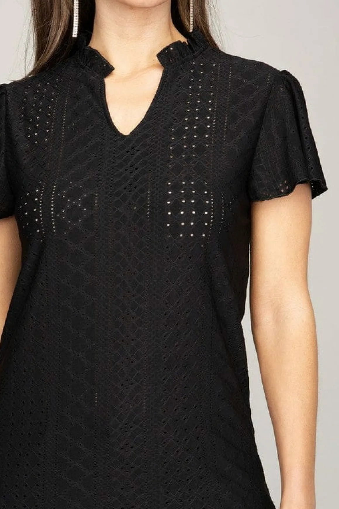 embroidered_eyelet_blouse_3.webp Embroidered eyelet blouse with ruffle *Online Only*