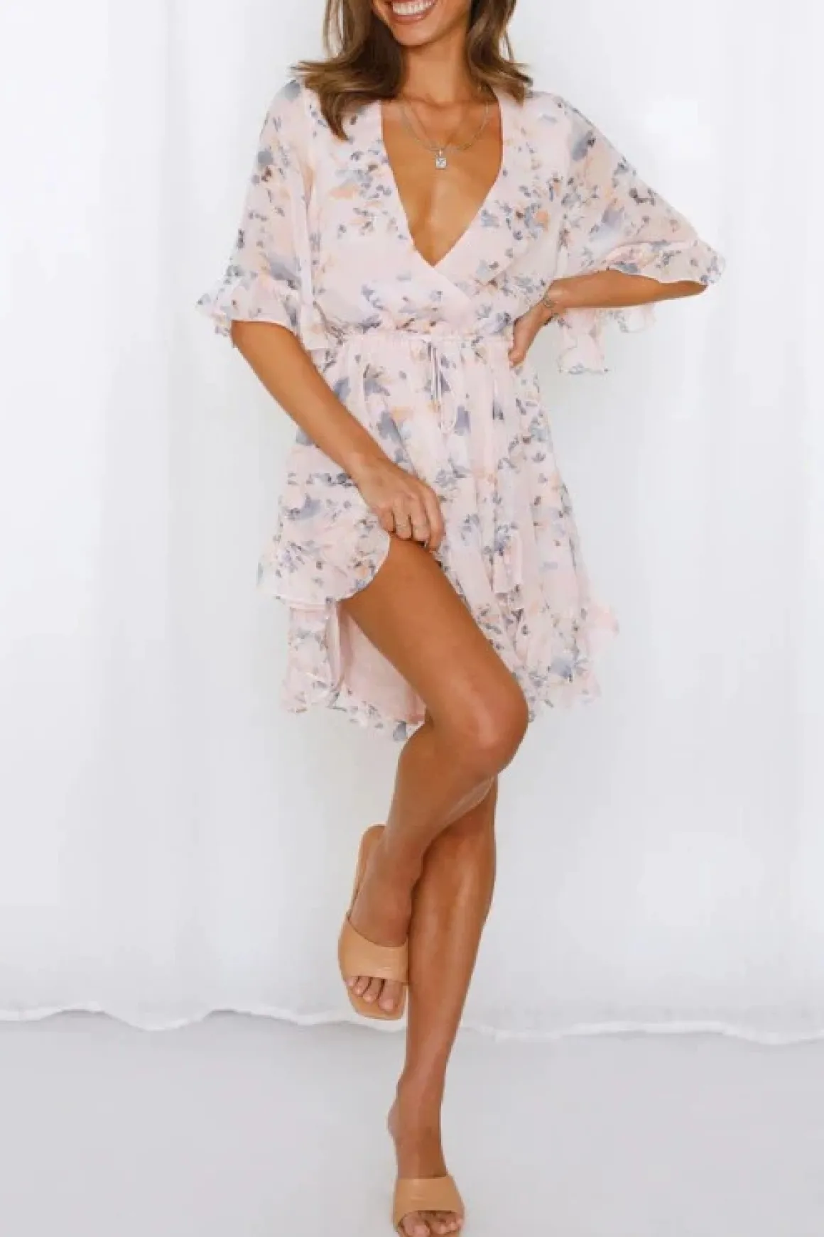 floral_printed_ruffled_mi_2.webp Floral Printed Ruffled Mini Dress *Online Only*