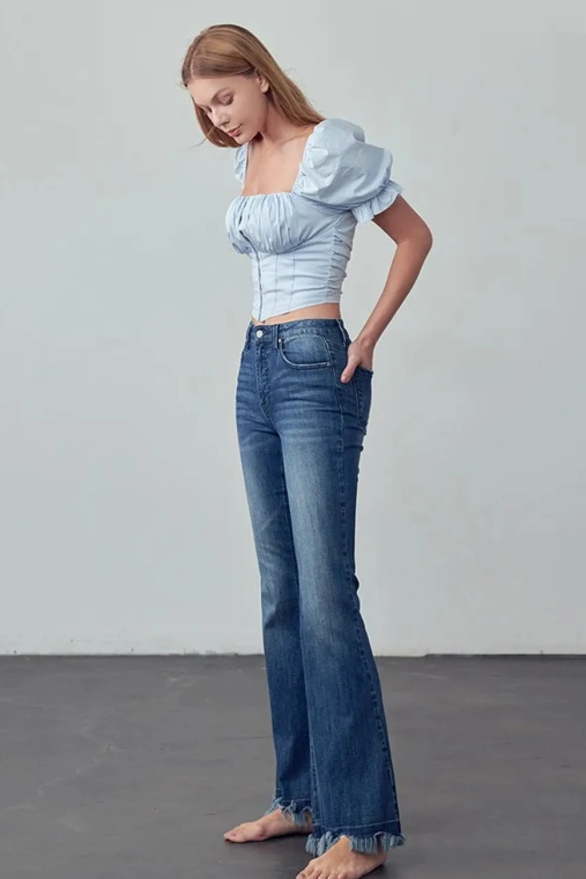 frayed_hem_flare_jeans_on_3.webp Frayed Hem Flare Jeans *Online Only*