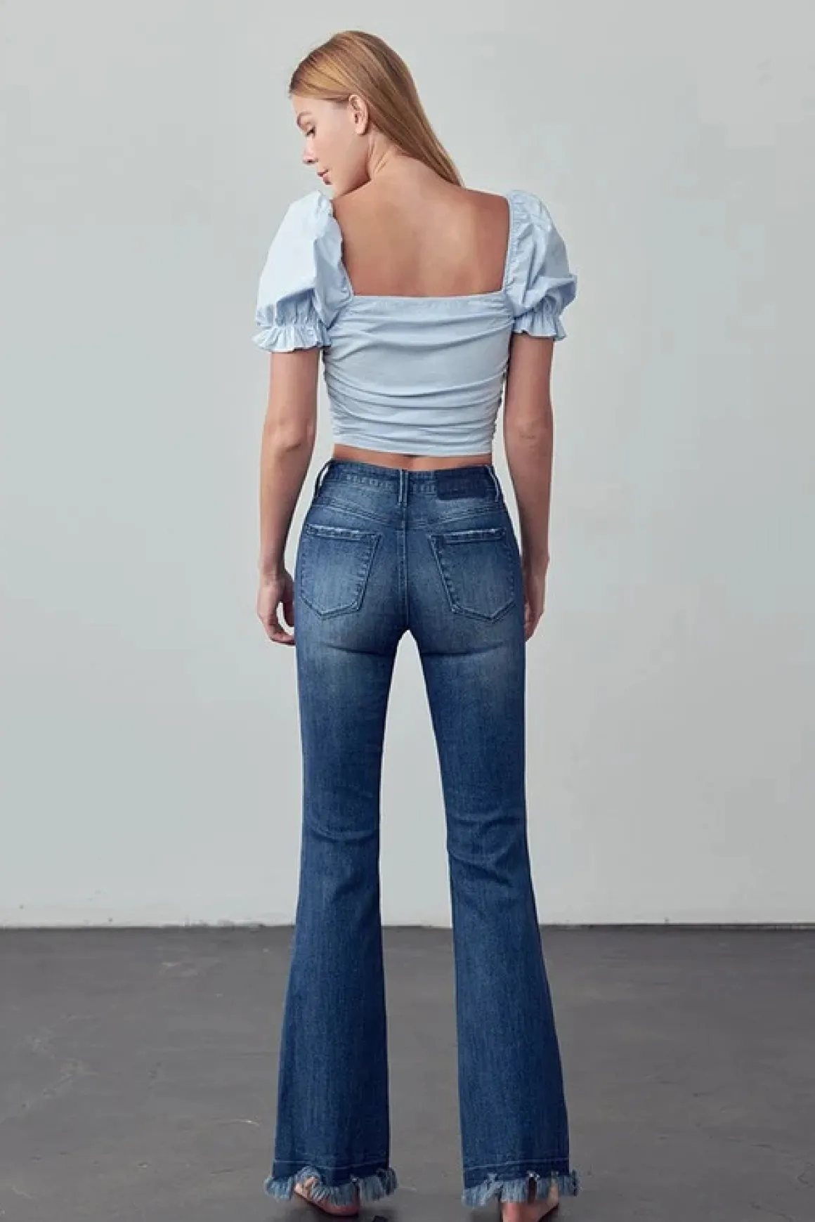 frayed_hem_flare_jeans_on_5.webp Frayed Hem Flare Jeans *Online Only*