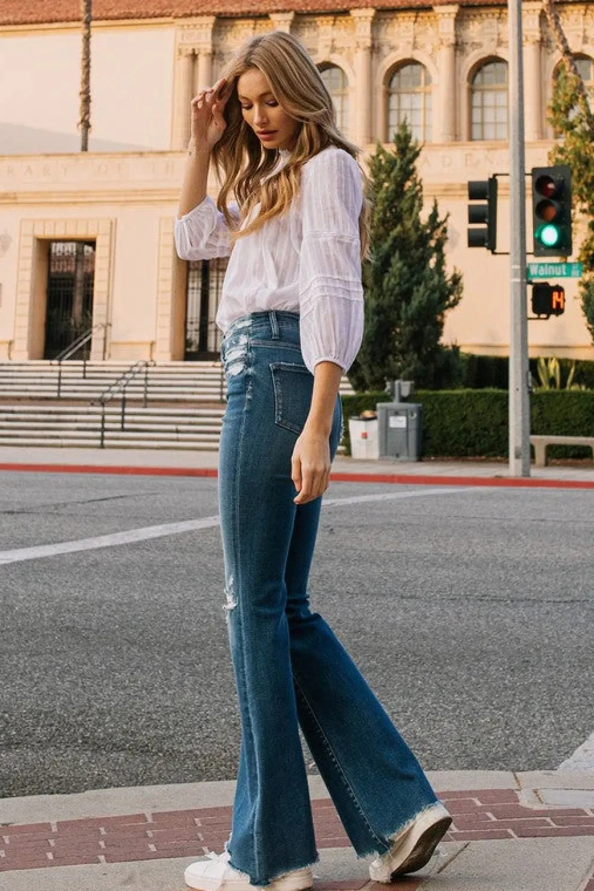 high_rise_distressed_raw__2.webp High Rise Distressed Raw hem Flare *Online Only*