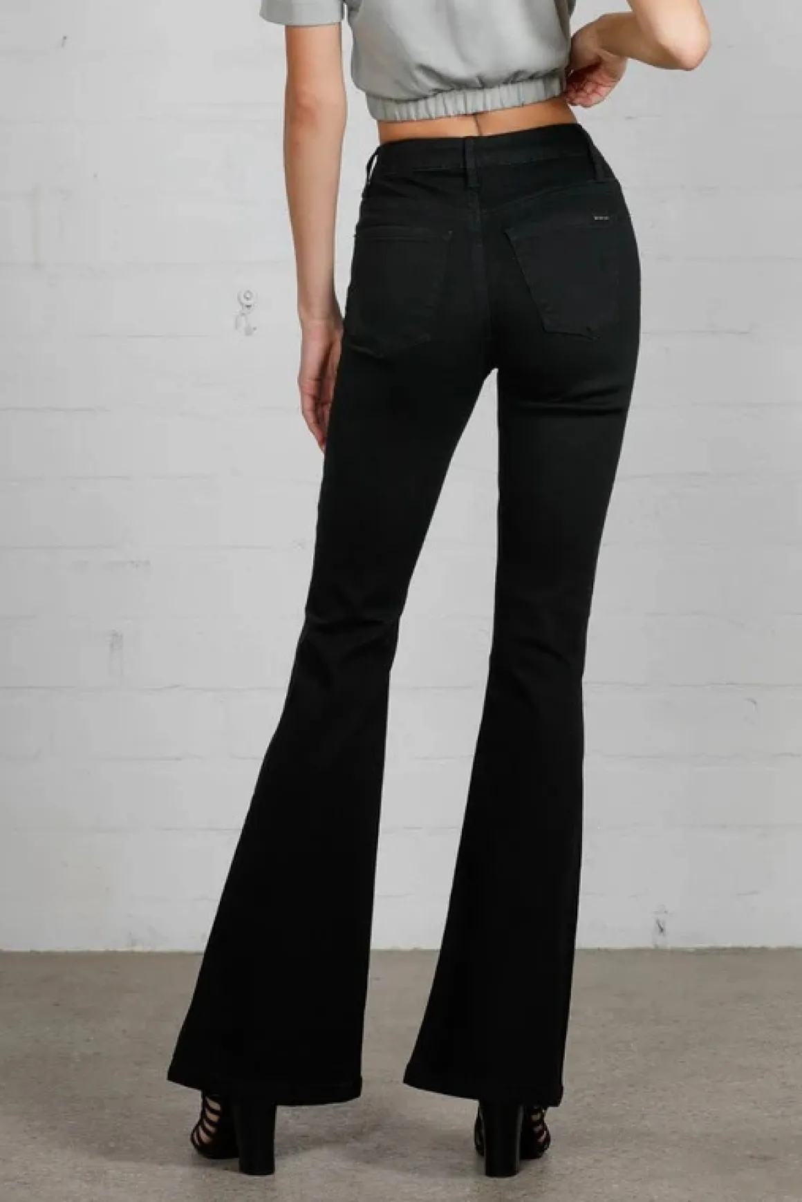 high_rise_wider_black_fla_1.webp High Rise Wider Black Flare Jeans
