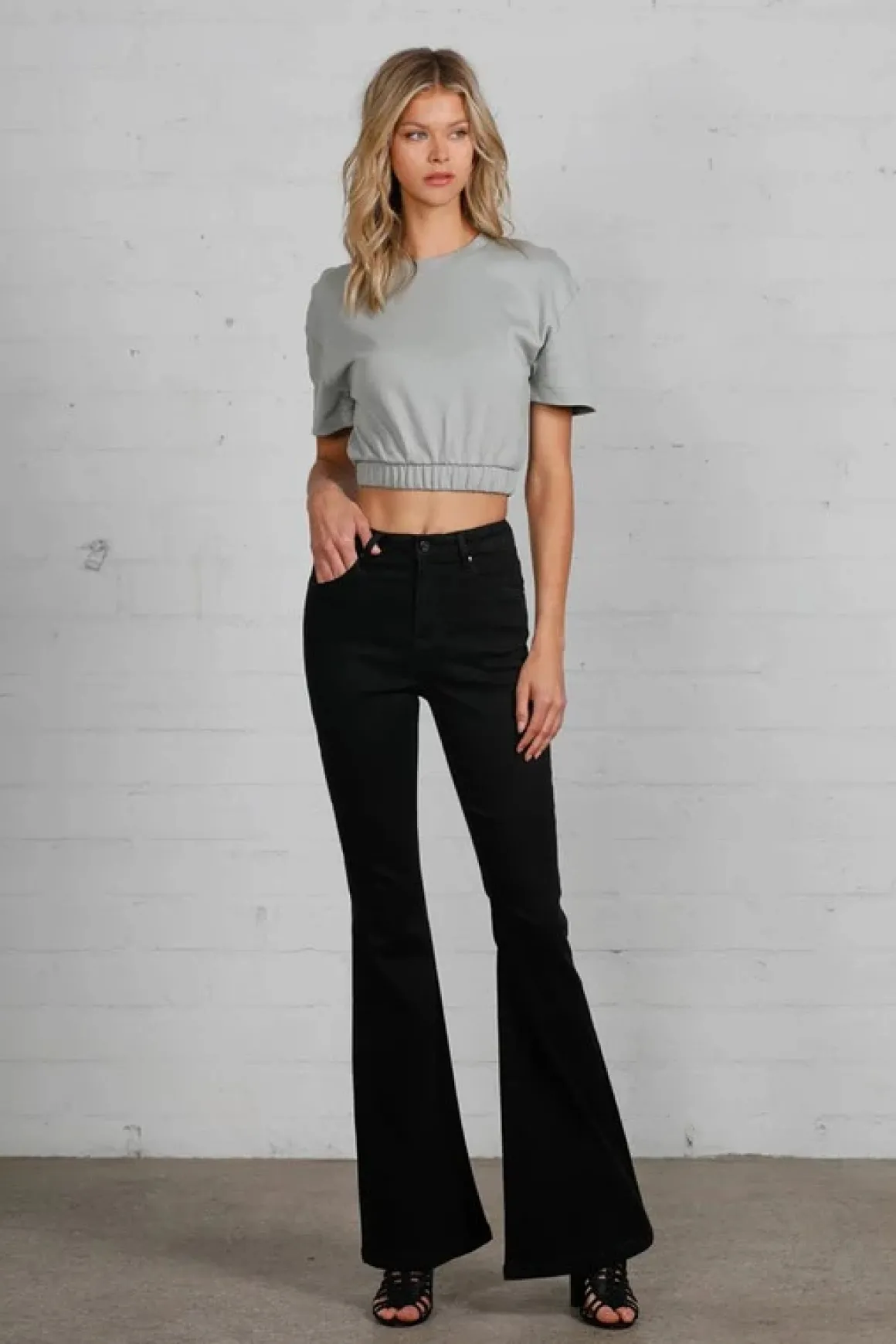 high_rise_wider_black_fla_2.webp High Rise Wider Black Flare Jeans
