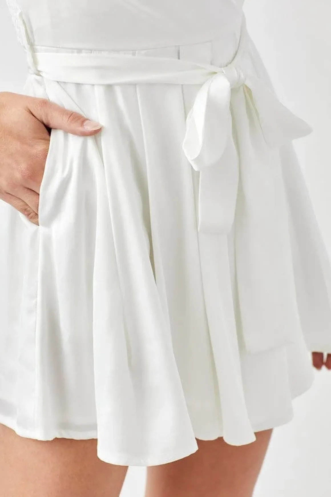 pleated_puff_sleeve_overw_3.webp Pleated Puff Sleeve Overwrap Romper *Online Only*