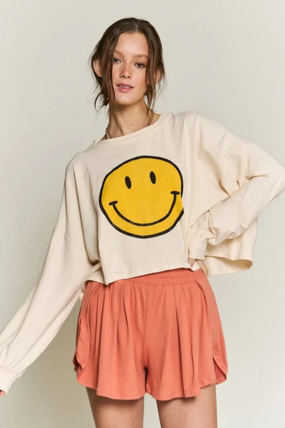 smiley_face_long_sleeve_c_3.webp SMILEY FACE LONG SLEEVE CROP TOP *Online Only*