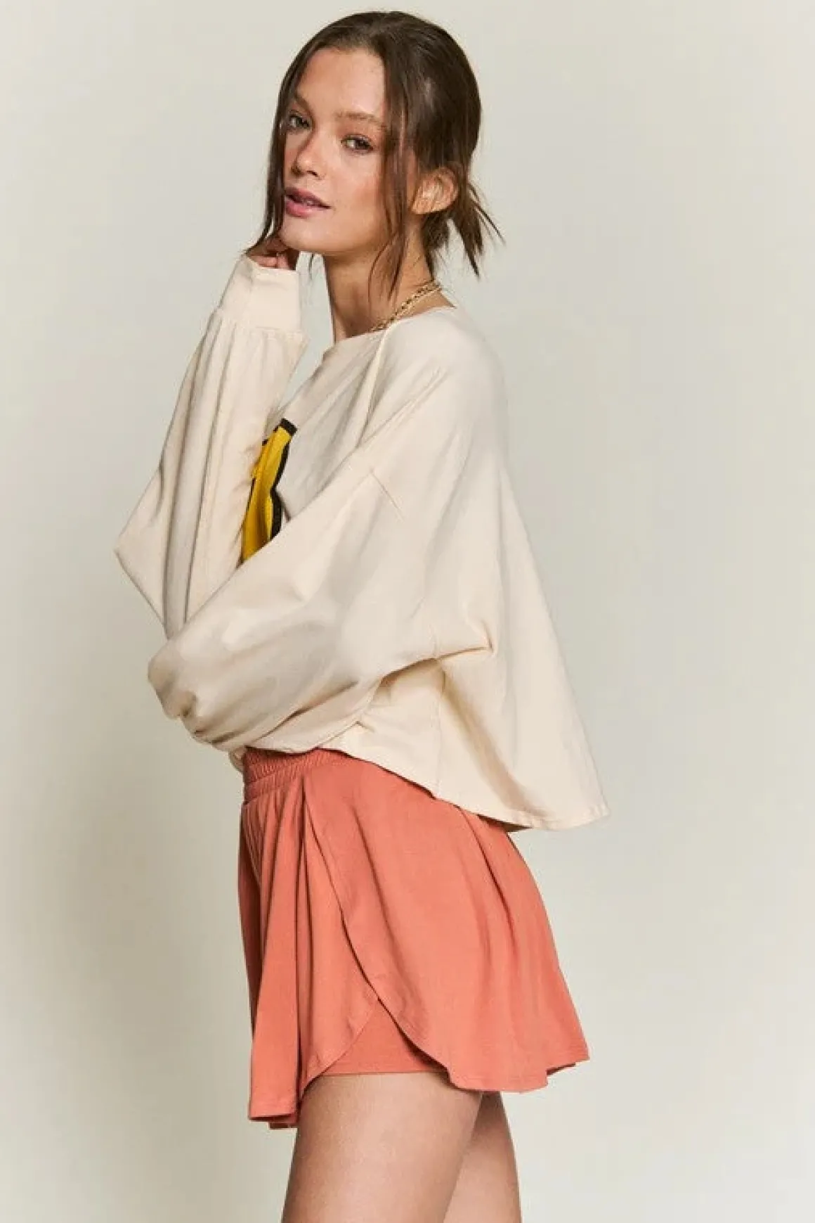 smiley_face_long_sleeve_c_4.webp SMILEY FACE LONG SLEEVE CROP TOP *Online Only*
