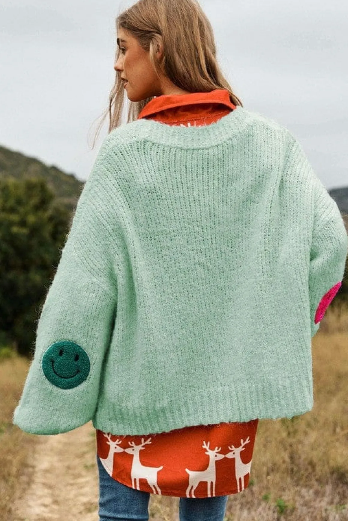 the_fuzzy_smile_long_bell_12.webp The Fuzzy Smile Long Bell Sleeve Knit Cardigan