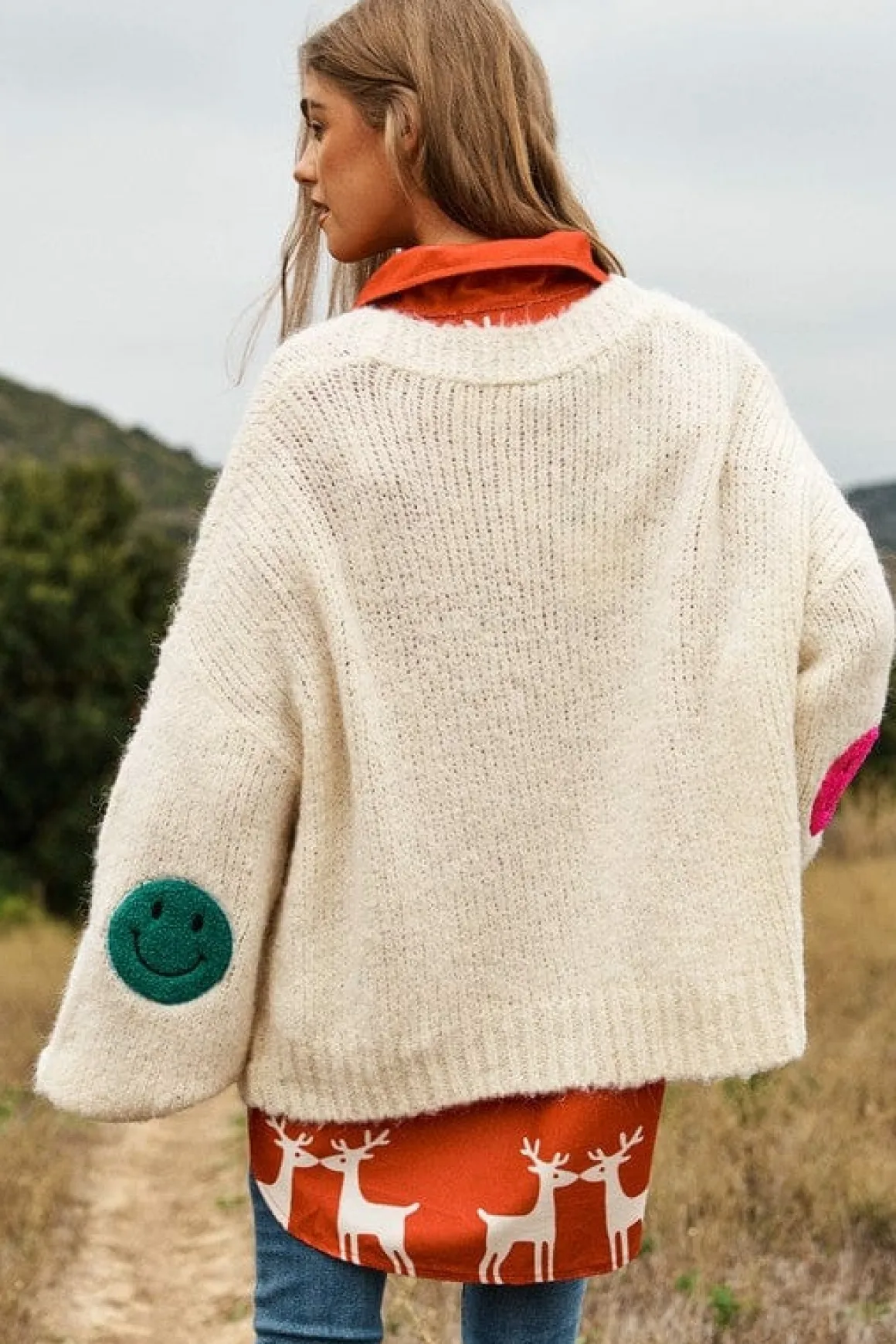 the_fuzzy_smile_long_bell_5.webp The Fuzzy Smile Long Bell Sleeve Knit Cardigan