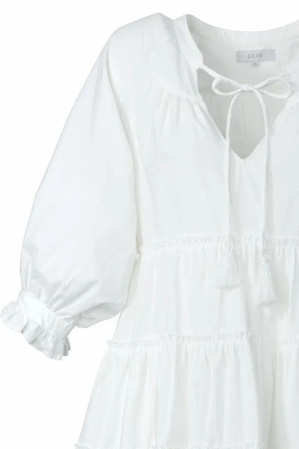 tiered_mini_dress_with_ta_11.webp Tiered mini dress with tassel *Online Only*